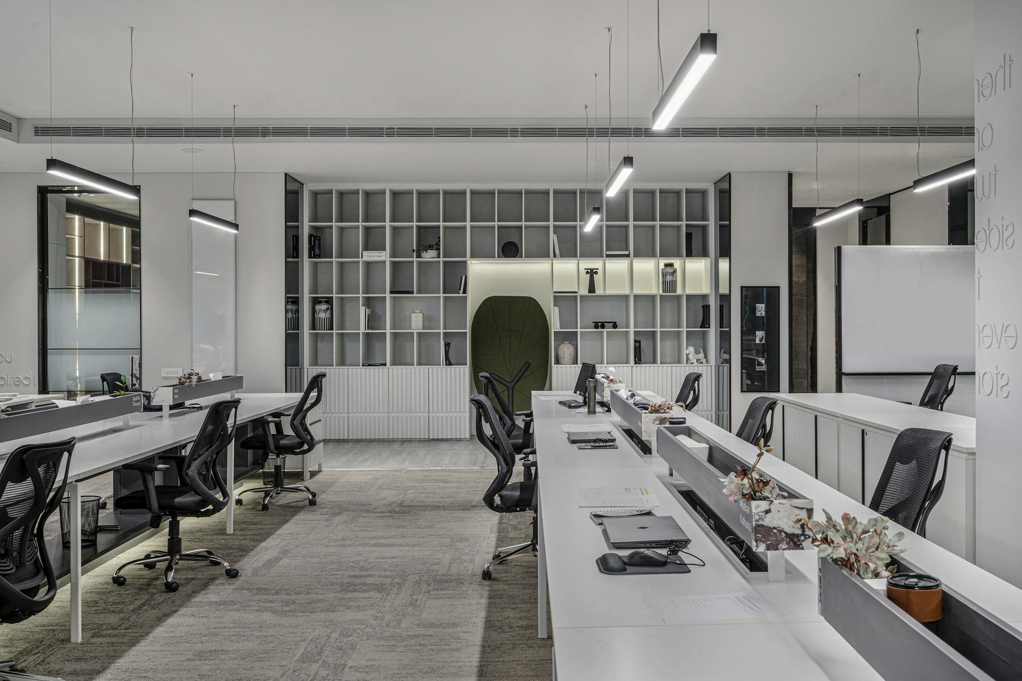 Explore this modern luxury office interior with open workspaces and sleek minimalist design.